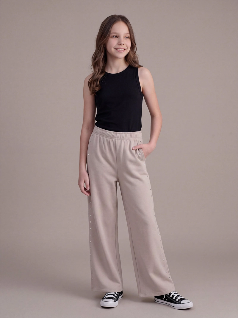 PANTALÓN DE BUZO NIÑA INDEX TEEN ALGODÓN WIDE TACHAS