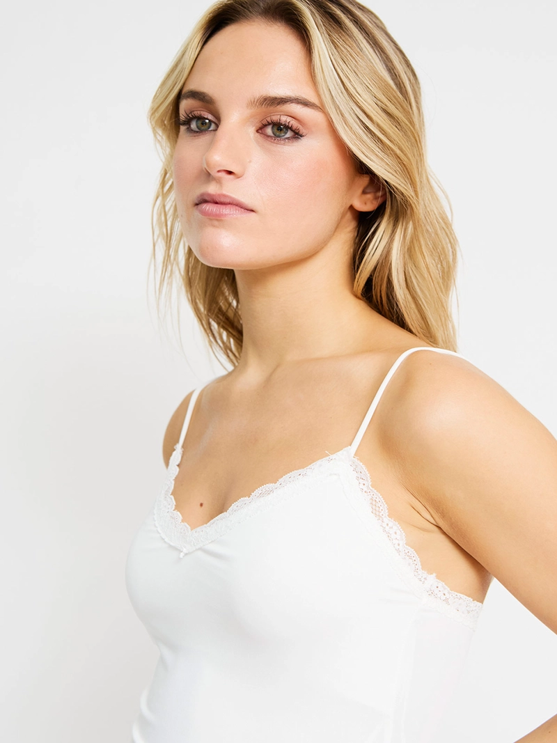 POLERA MUJER INDEX SIN MANGAS ASIMÉTRICA - 3