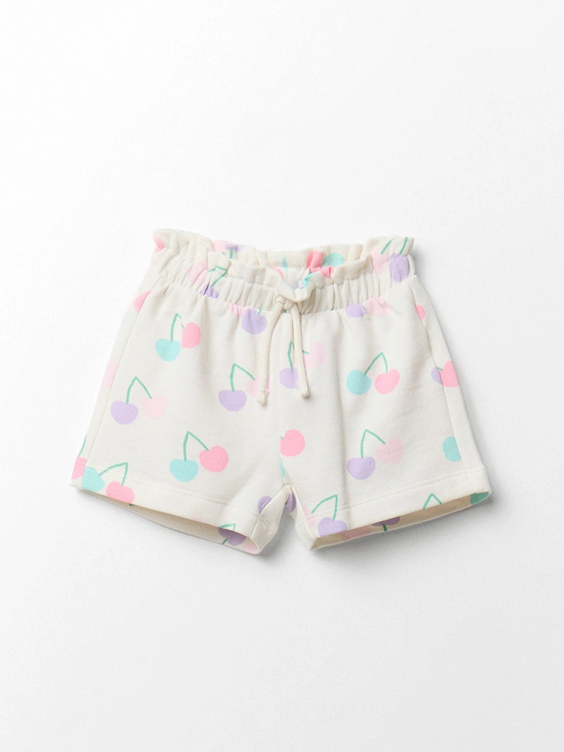 SHORT NIÑA SFERA ESTAMPADO CEREZA CORDÓN AJUSTABLE CINTURA