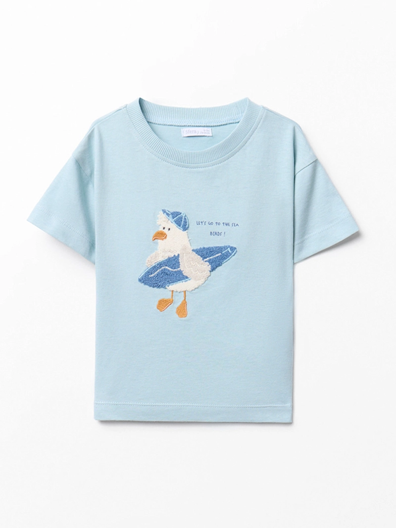 POLERA BEBÉ NIÑO SFERA ALGODÓN MANGA CORTA CUELLO REDONDO ESTAMPADO GAVIOTA SURFERA
