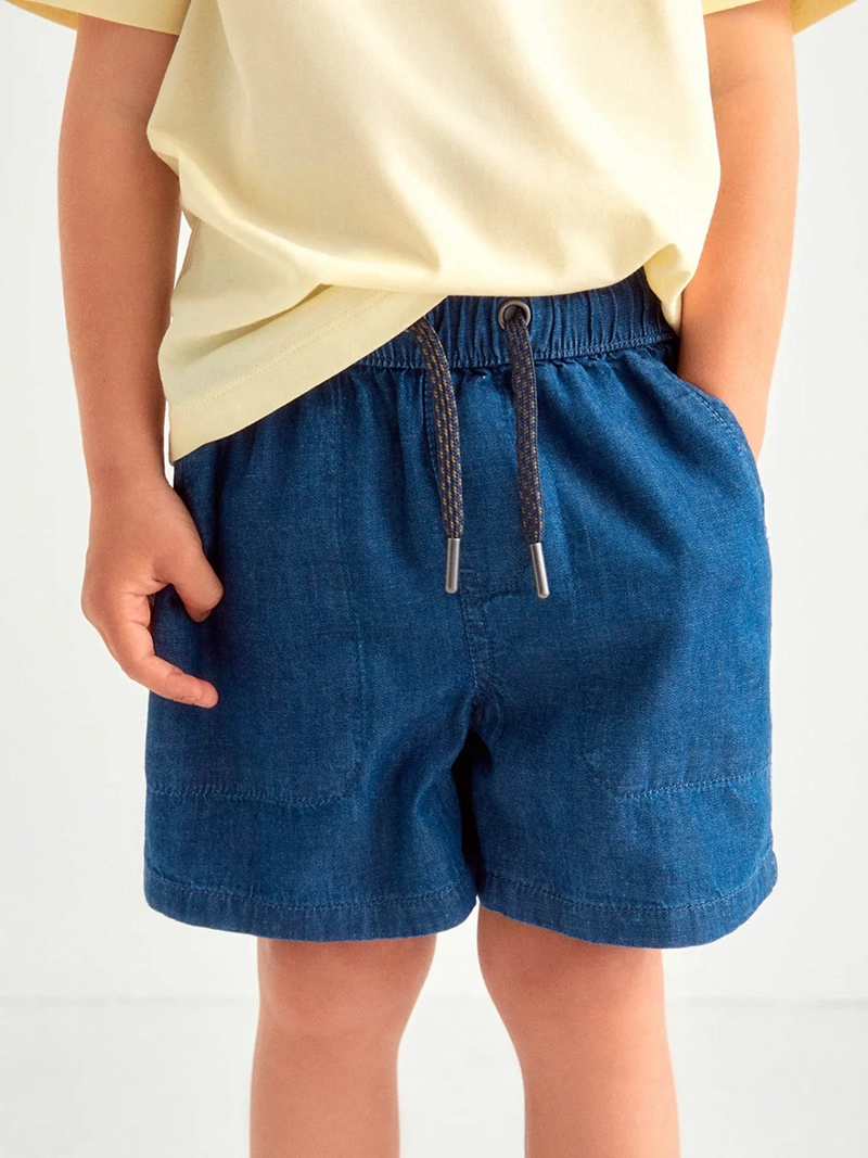 SHORT NIÑO SFERA FLUIDO CON BOLSILLOS DELANTEROS Y CORDÓN AJUSTABLE - 3