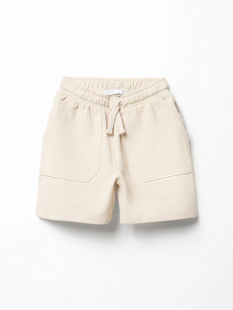 SHORT NIÑO SFERA LISO CON BOLSILLOS DELANTEROS - 2