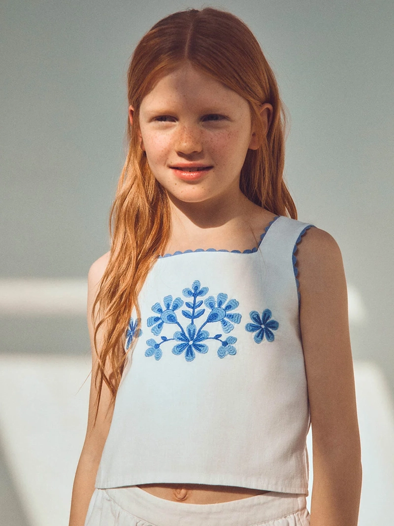 BLUSA NIÑA SFERA TIRANTES DETALLE BORDADO DELANTERO ESPALDA ASIMÉTRICA - 1