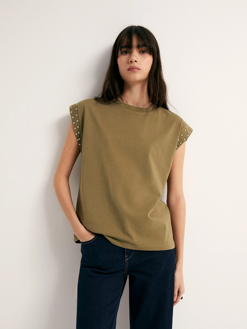 POLERA MUJER SFERA SIN MANGAS TACHAS - 1