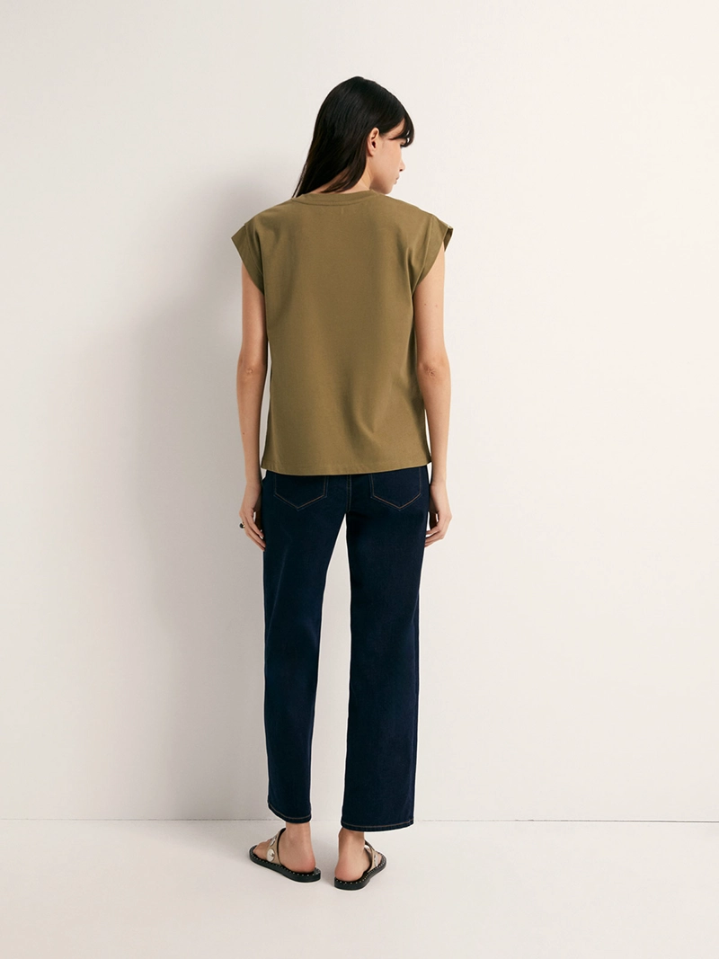 POLERA MUJER SFERA SIN MANGAS TACHAS - 4