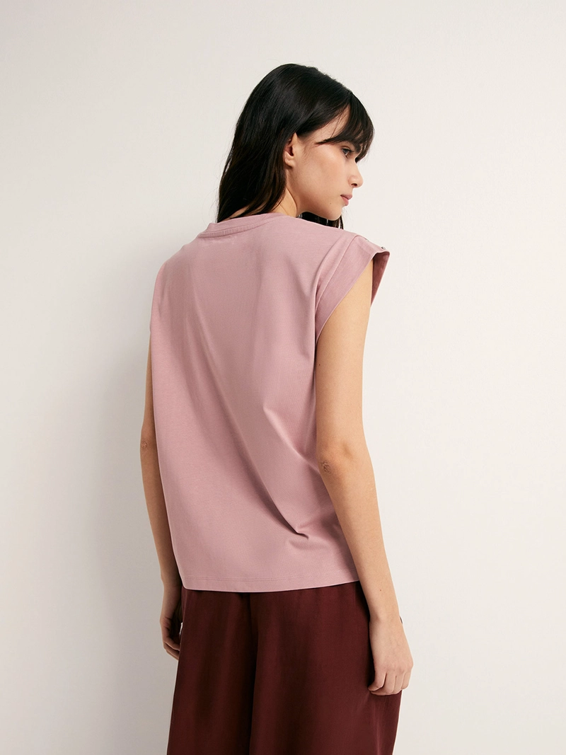 POLERA MUJER SFERA SIN MANGAS TACHAS - 2