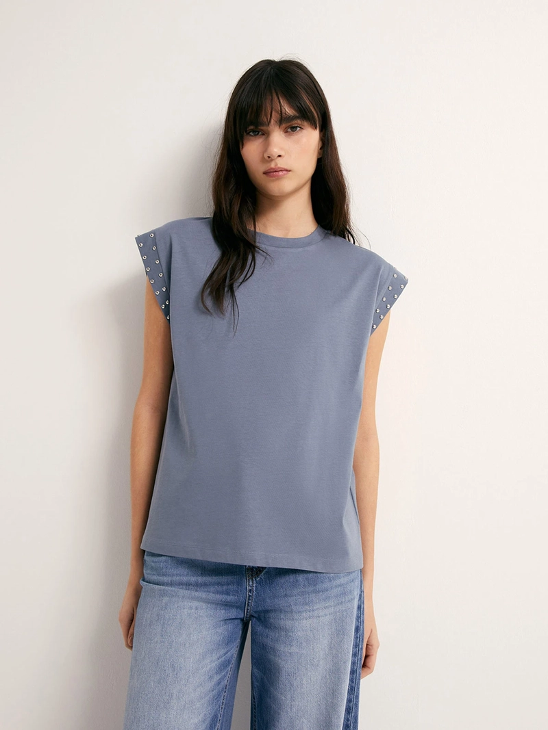 POLERA MUJER SFERA SIN MANGAS TACHAS - 1